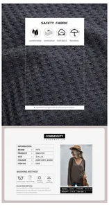 Detail of waffle knit fabric texture and features for irregular long sleeve V-neck sweater