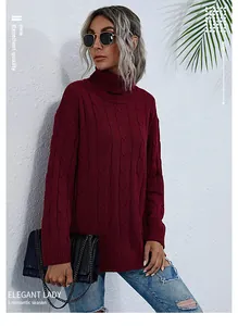 Détail du pull bordeaux à col montant avec texture classique en maille torsadée et tissu doux