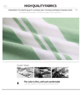 Macro detail of green and white striped knit fabric showing texture and stitching quality