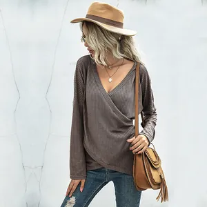 Women's dark brown waffle knit wrap top with V-neck and asymmetric hem in casual style