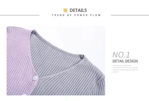 Detail shot of V-neck ribbed knit cardigan featuring purple and grey color block panels
