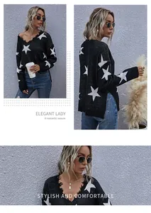 Detailed view of black V-neck star pattern knit sweater with distressed edges and side slits