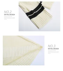 Detail of cable knit texture and black striped cuffs on a cream V-neck sweater
