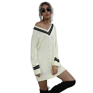 Oversize cream cable knit V-neck sweater dress with contrast black striped trim details