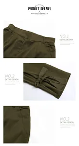 Dettaglio della vita alta con fiocco e tasche laterali sui pantaloni verde oliva