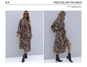 Detail view of leopard print V-neck long sleeve dress with elastic waist and tie belt