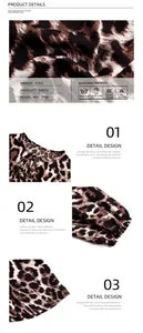 Detail view of leopard print dress showing V-neck tie, elastic cuffs and fabric texture