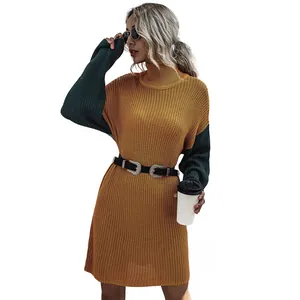Detail of high neck color-block knit dress in mustard yellow and forest green sleeves