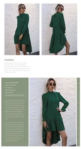 Detail of dark green layered dress featuring ruffled cuffs and asymmetrical hem