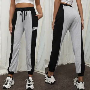 Women's color-block joggers with drawstring and COURAGE letter print on the leg