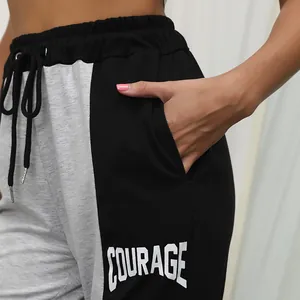 Women's color-block joggers with drawstring waist and COURAGE letter print design