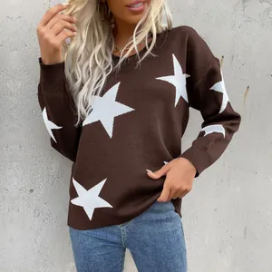 Women's long sleeve dark brown knit sweater with large white star patterns and crew neck
