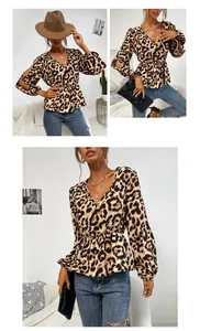 Detail view of leopard print long sleeve top featuring V-neckline and split sleeve design