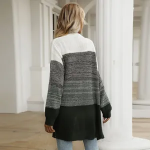 Women's color block knit cardigan with white, grey and dark green oversized panels
