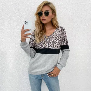 Women's V-neck long sleeve top with leopard print stitching and grey casual patchwork design