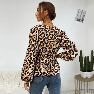 Women's leopard print long sleeve V-neck blouse with elastic waist and hollow detail