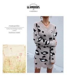 Detail of V-neck leopard knit dress with distressed hem and oatmeal knit texture