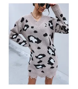 Detail of V-neck leopard print knit dress with distressed hem and ripped fringe design