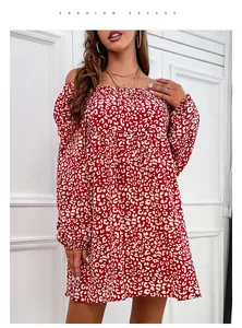 Detail of red leopard print off-shoulder dress with elastic cuffs and floral patterns
