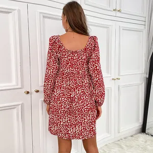 Women's off-shoulder red animal print dress with long puff sleeves and open back design