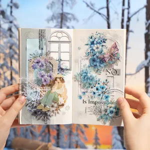 Winter floral PET scrapbooking tape with girl and butterfly illustrations on notebook