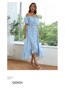 Detail showing off-shoulder floral dress with brown buttons and irregular fishtail hem