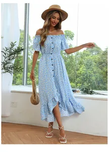 Close-up of front buttons and elastic waist on light blue floral off-shoulder dress