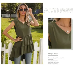 Detail of olive green V-neck sleeveless top with ruffled high-low hem in outdoor setting