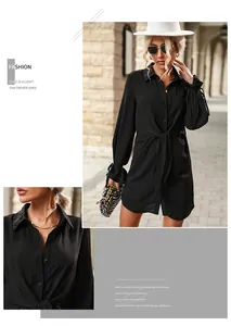 Détail d'une robe chemise noire avec manches évasées à nouer et nœud à la taille