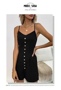 Close-up of black sleeveless summer romper with V-neckline and decorative front buttons