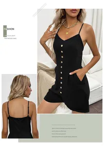 Detail of black summer romper featuring vintage wooden buttons and adjustable straps