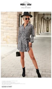 Detail of leopard print shirt dress with lapel collar and waist tie-up belt