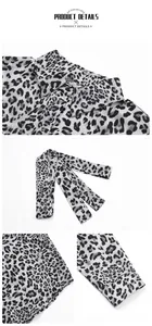 Detail of leopard print shirt featuring lapel collar, button placket and matching waist belt