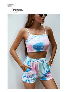 Detail of tie-dye crop top and shorts set featuring Pacific Sunshine lettering print