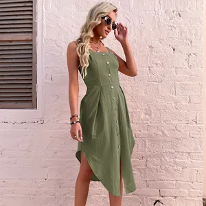 Detail of army green cotton linen dress featuring front buttons and irregular hem design