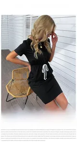 Detail of adjustable white drawstring on casual black short sleeve T-shirt dress