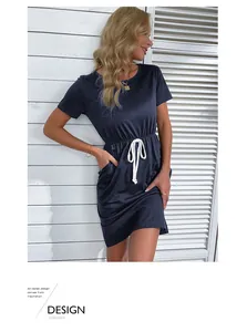 Detailed view of the navy blue short sleeve dress with adjustable white drawstring waist