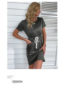 Detail of olive green t-shirt dress showing round neck and adjustable white drawstring waist
