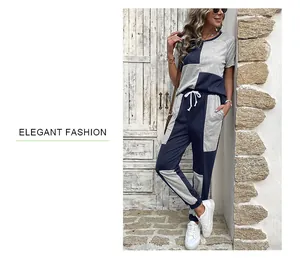 Detail of blue and gray color block loungewear set with white drawstring and elastic waist