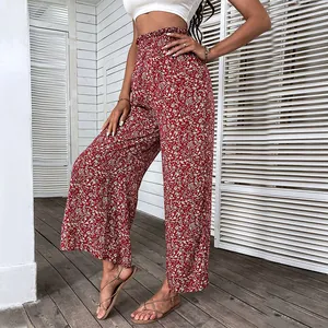 Women's high waist red floral wide leg trousers with a smocked waist and relaxed summer fit