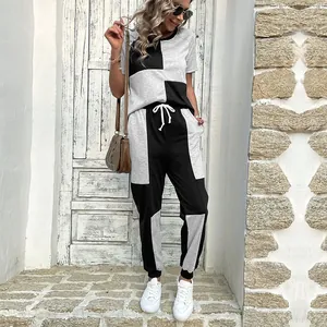 Women's 2-piece lounge set with short sleeve top and drawstring joggers in color block design