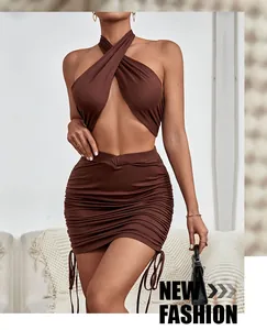 Detailed view of the dark brown ruched mini skirt with adjustable side drawstring