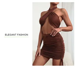 Detail of drawstring side ruching on brown bodycon skirt with high-stretch fabric texture