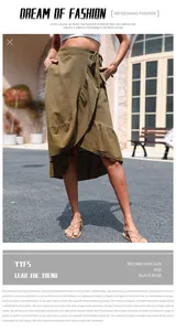 Detailed close-up of dark green wrap skirt with ruffles and side tie in cotton linen