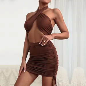 Brown two-piece set featuring halter neck crop top and drawstring ruched bodycon skirt