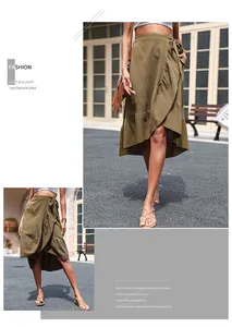 Detail of olive green wrap skirt showing ruffled hem and linen fabric texture