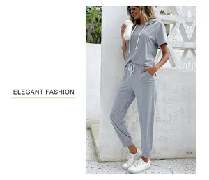 Detail of grey casual two-piece set with short sleeve hoodie and matching sweatpants