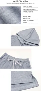Detailed views of light gray knit hoodie set featuring drawstring waist and side slit hem