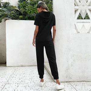 Women's black casual two-piece tracksuit with short-sleeved hoodie and jogger pants