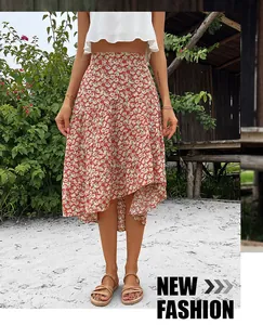 Detail of red floral ruffled skirt with layered tiers and asymmetrical high-low hemline